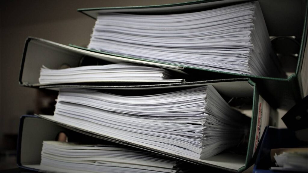 Lots of legal paperwork placed inside file folders